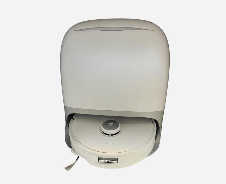 White Roborock Curve vacuum in charging dock. Click on picture link to purchase vacuum online.